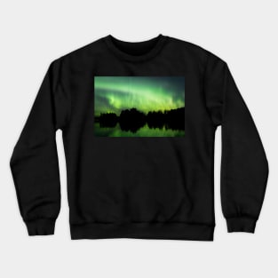 Northern lights glowing over lake in Finland Crewneck Sweatshirt